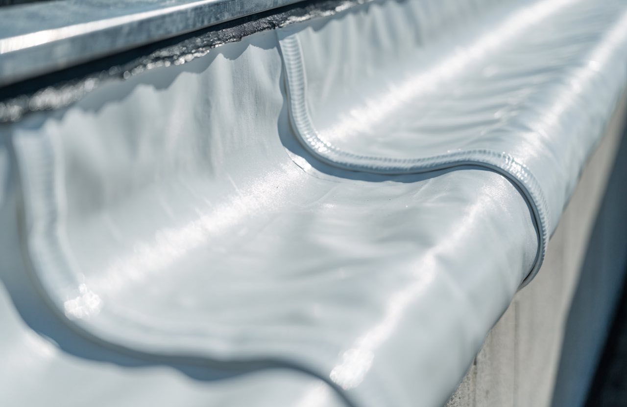 Close inspection of commercial roofing details
